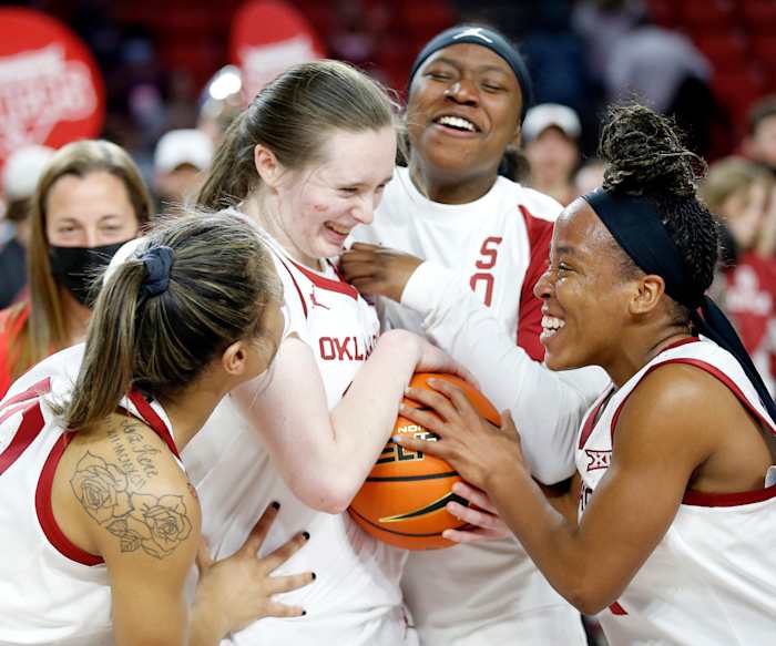 OU’s Taylor Robertson celebrates breaking the Big 12 women’s record for most career 3-pointers after beating Baylor 83-77.
